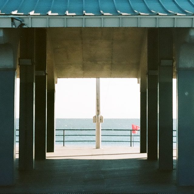 Boardwalk pavilion and the sea, Coney Island
